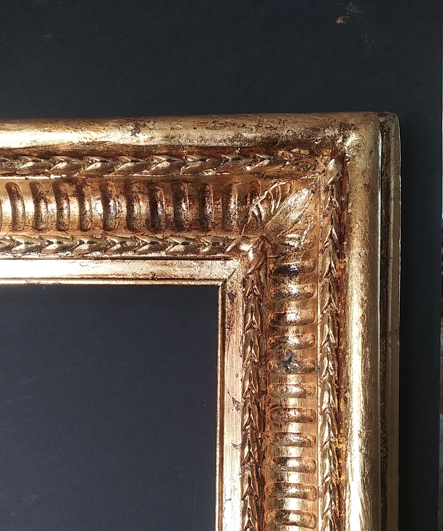 20' x 39" 19th Century Gilded Fluted Cove Frame with Carved Bell Flower Ornament